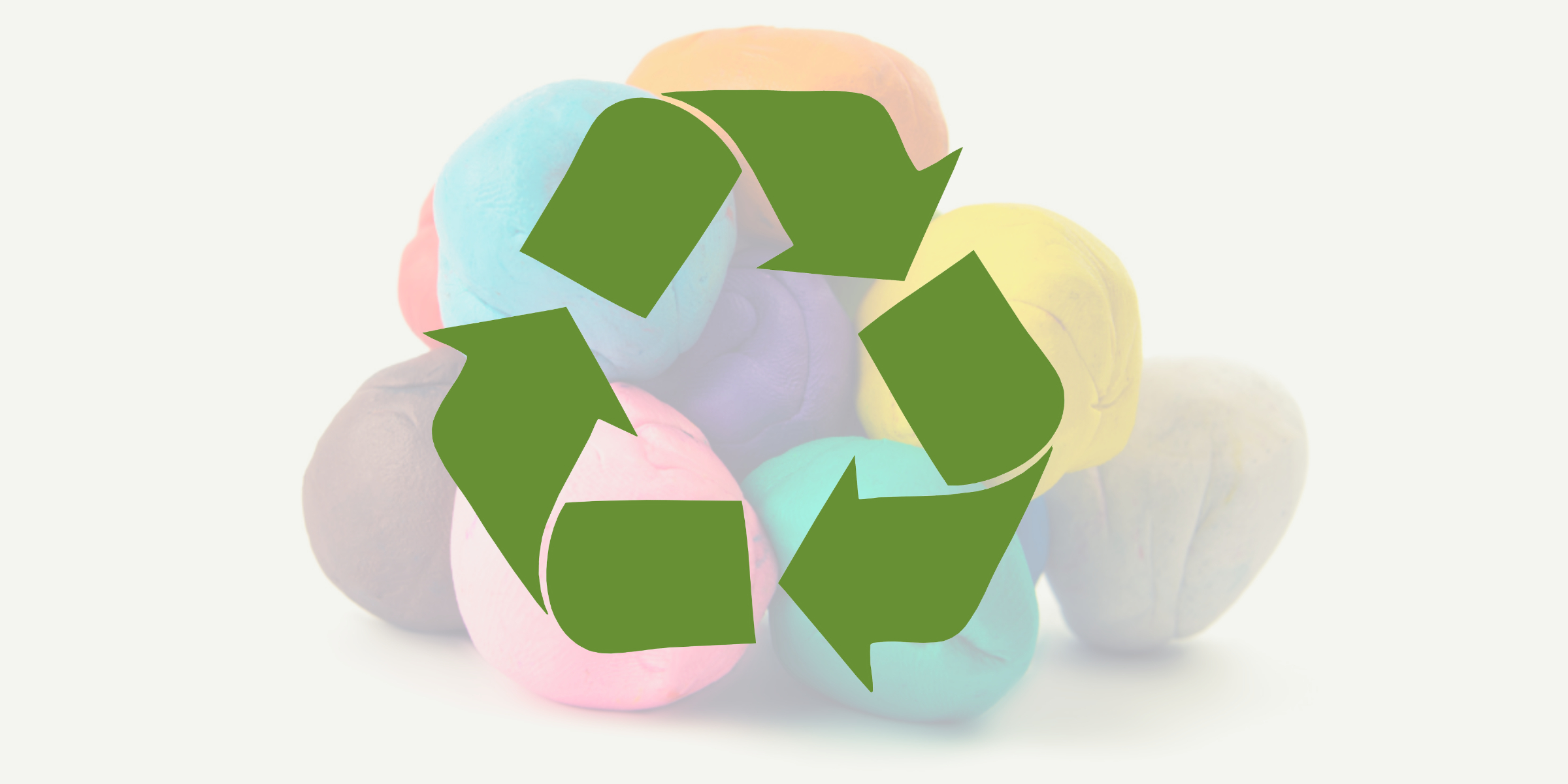 A group of colorful candies with a recycle symbol.